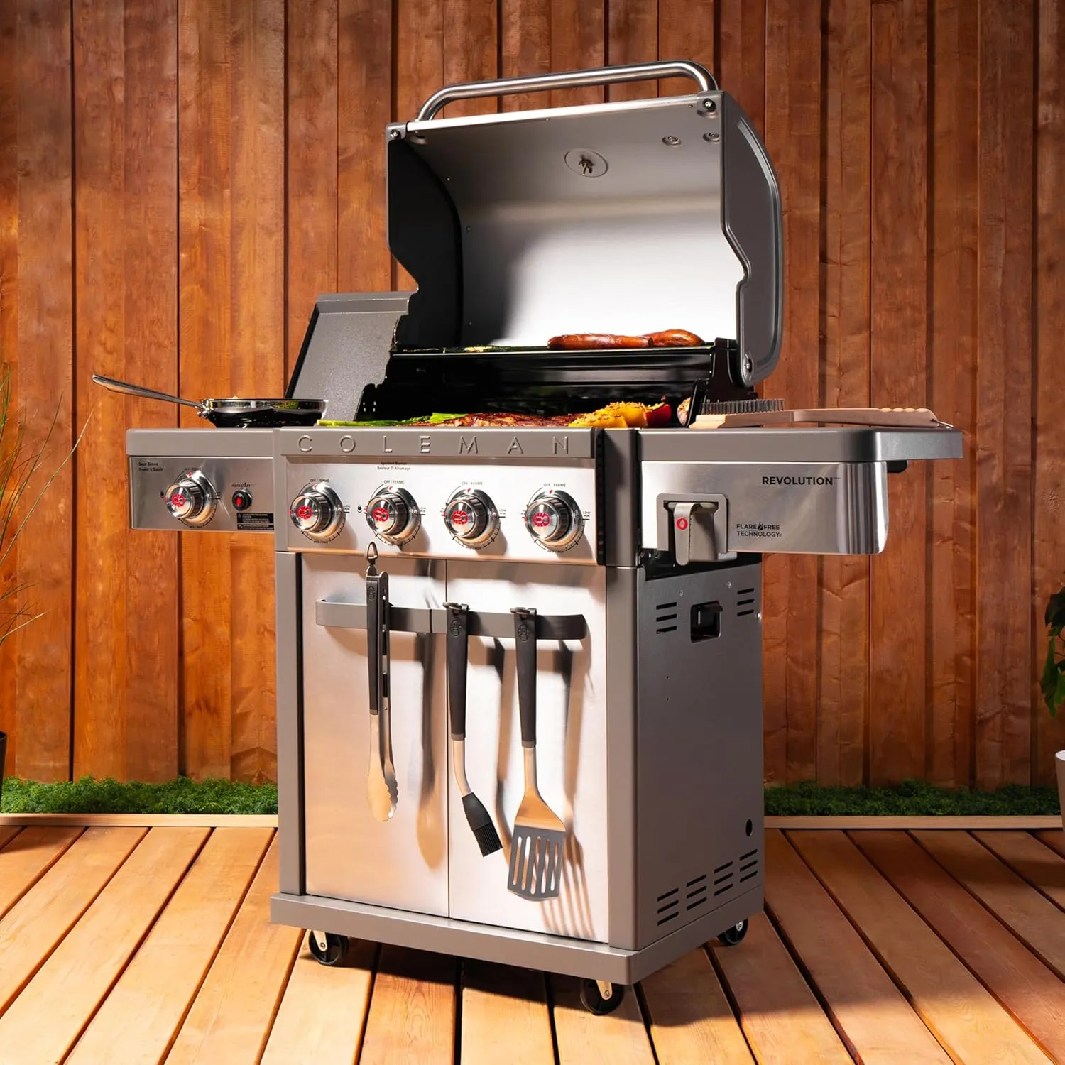Coleman Revolution 4-Burner Gas Grill with Side Burner, 50,000 BTU Propane Grill with 680-Sq. In. Total Cooking Surface, Flare-Free Grates, and 4-Wheel Compact Cart, Portable BBQ in Stainless/Gray