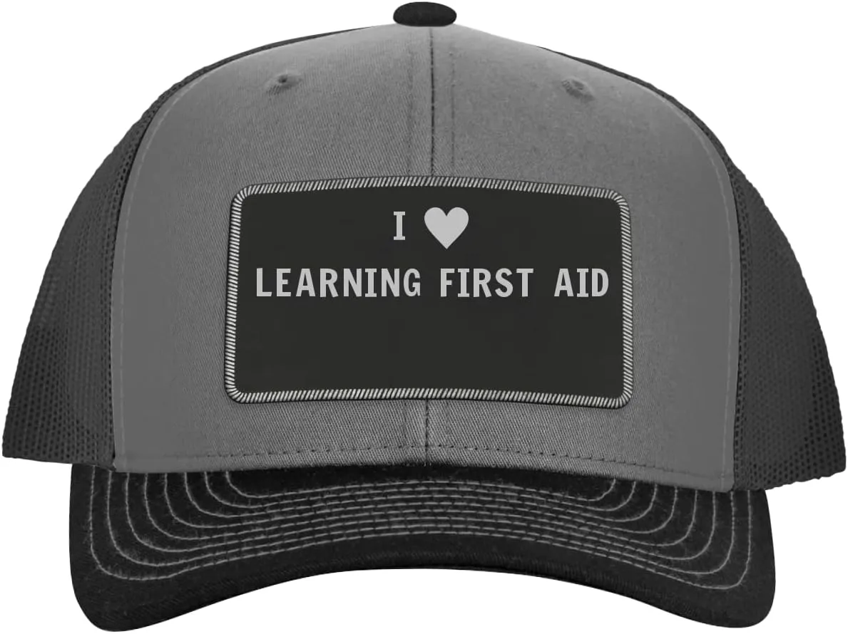 I Heart Love Learning First Aid - Leather Black Patch Engraved Trucker Hat