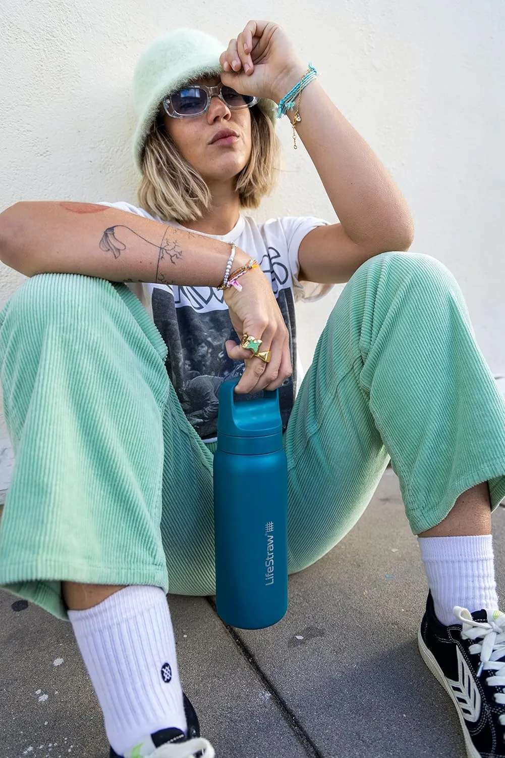LifeStraw Go Series — Insulated Stainless Steel Water Filter Bottle for Travel and Everyday Use Removes Bacteria, Parasites and Microplastics, Improves Taste, 24oz Laguna Teal