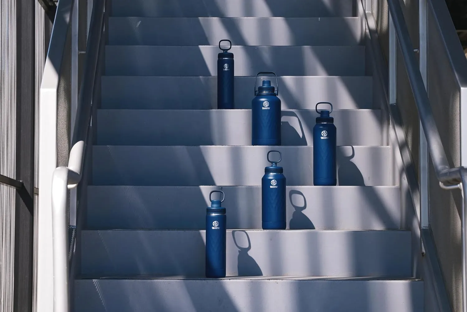 Takeya Sport 40 oz Triple-Insulated Stainless Steel Water Bottle, Spout Lid – Leakproof, Sweatproof, BPA-Free, Keeps Drinks Cold 36 Hrs, Hot 14 Hrs – Indigo