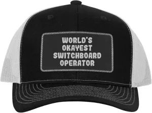 World's Okayest Switchboard Operator - Leather Black Patch Engraved Trucker Hat